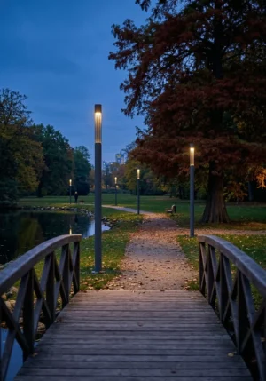 Illuminated OptoSmart Gallancia Dark Sky approved architectural poles providing eco-friendly, zero upward lighting along a park pathway at night.